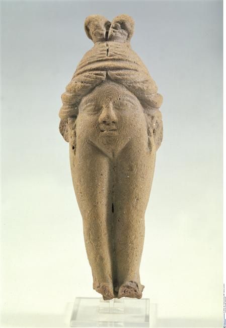 A sculpture of Baubo, goddess of sacred and sexual humor