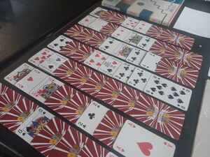 Solitaire version of cards played with 110